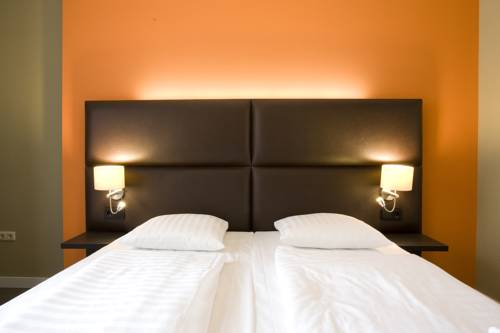 Imagen de la habitación del Hotel Roermond Next Door. Foto 11