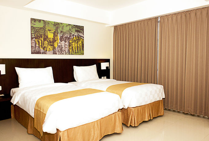 Imagen de la habitación del Hotel Rofa Kuta Hotel. Foto 11