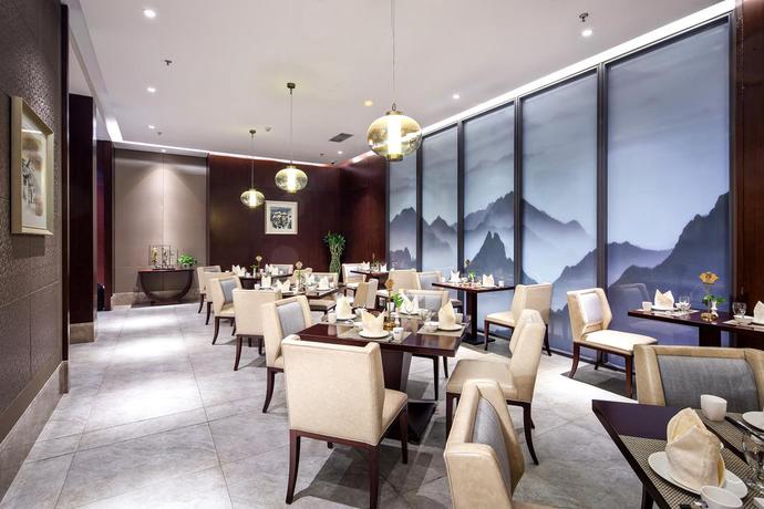Imagen del bar/restaurante del Hotel Roffar Tian Yue Gloria Plaza Xi'an. Foto 2