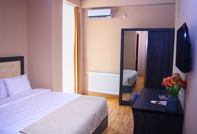 Imagen de la habitación del Hotel Rogalux. Foto 12