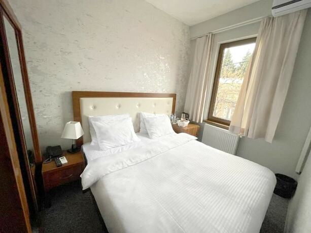 Imagen de la habitación del Hotel Rogas Home. Foto 15
