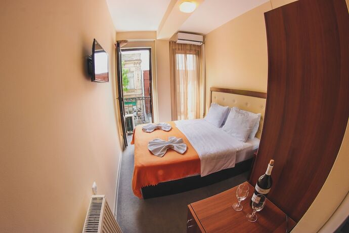 Imagen de la habitación del Hotel Rogas Home. Foto 19