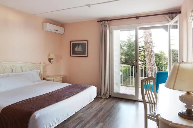 Imagen de la habitación del Hotel Roger De Flor Seleqtta. Foto 15