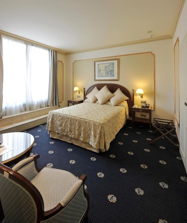 Imagen de la habitación del Hotel Roger De Lluria Barcelona. Foto 7