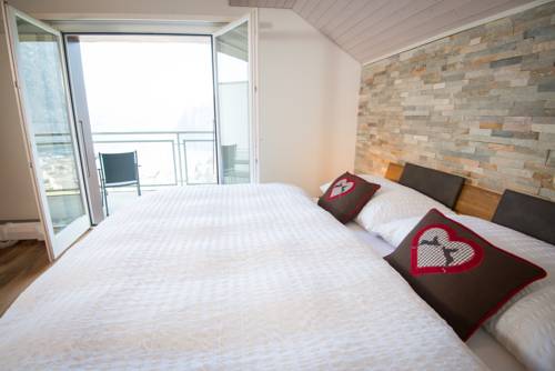 Imagen de la habitación del Hotel Roggerli. Foto 14