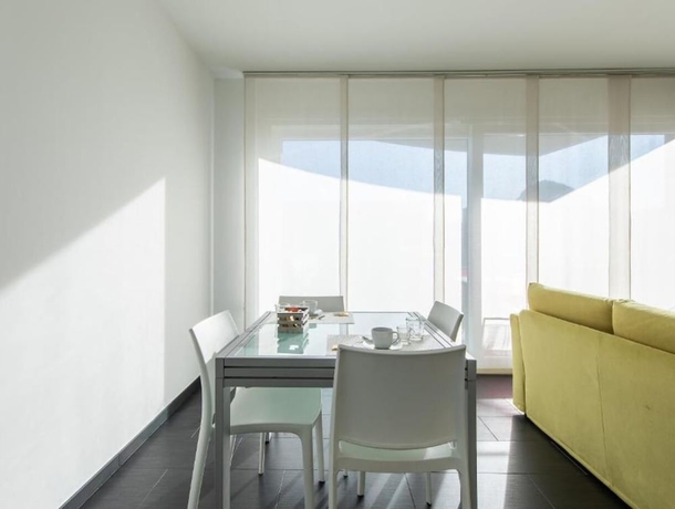 Imagen de la habitación del Hotel Roggia Apartments. Foto 17