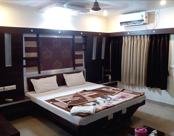 Imagen de la habitación del Hotel Rohini International. Foto 7