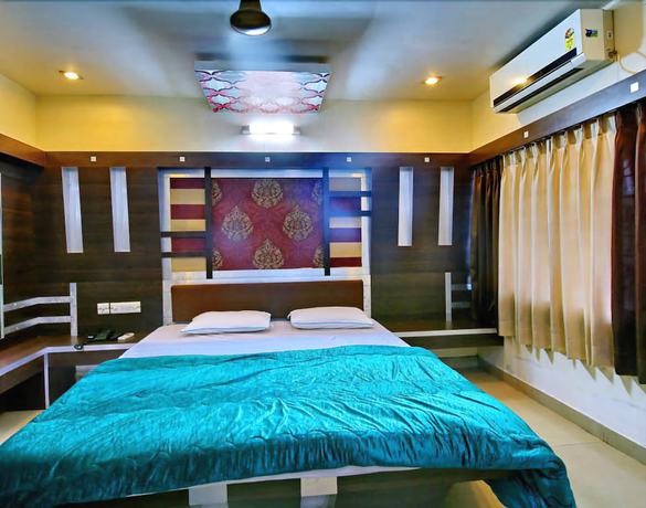 Imagen de la habitación del Hotel Rohini International. Foto 10