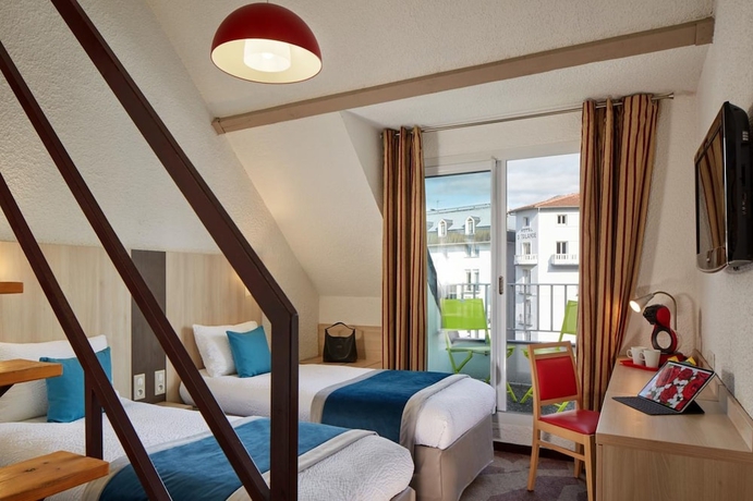 Imagen de la habitación del Hotel Roissy Lourdes. Foto 2