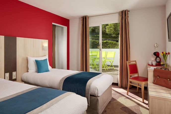 Imagen de la habitación del Hotel Roissy Lourdes. Foto 10