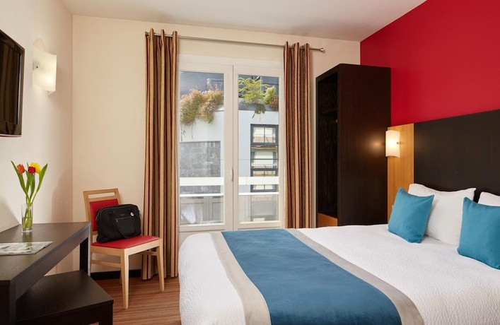 Imagen de la habitación del Hotel Roissy Lourdes. Foto 15