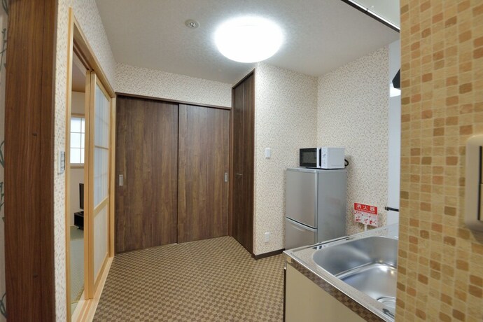 Imagen de la habitación del Hotel Rokuhara Inn. Foto 31