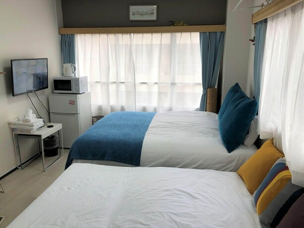 Imagen de la habitación del Hotel Rolans House 401. Foto 20