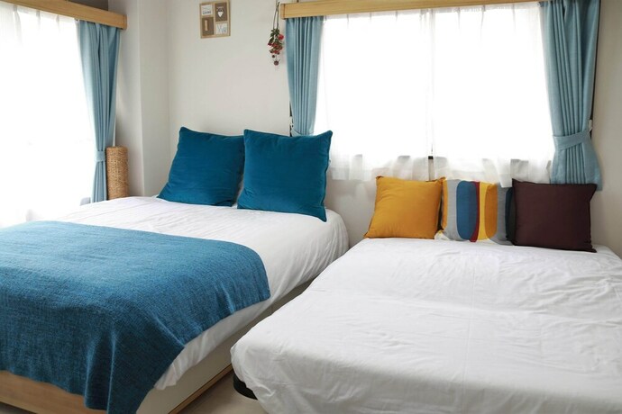 Imagen de la habitación del Hotel Rolans House 401. Foto 21