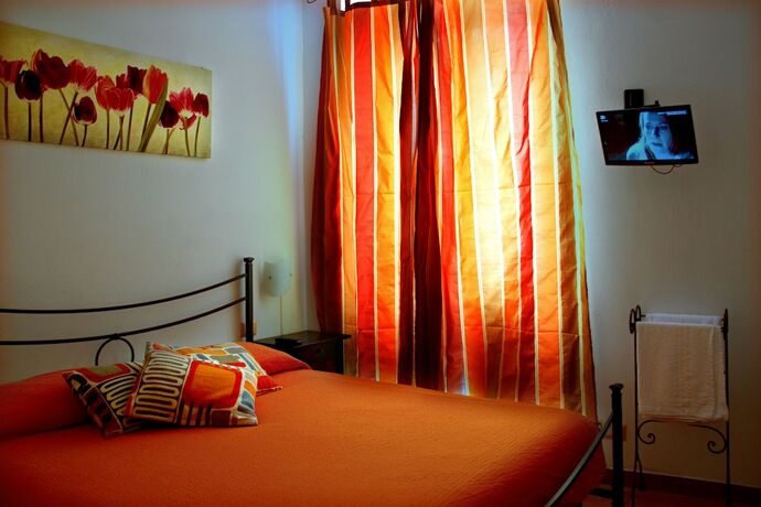 Imagen de la habitación del Hotel Rollando Affittacamere. Foto 18