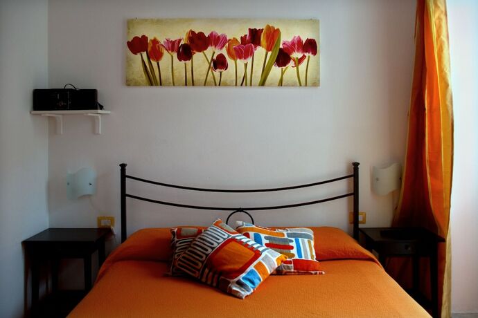 Imagen de la habitación del Hotel Rollando Affittacamere. Foto 20