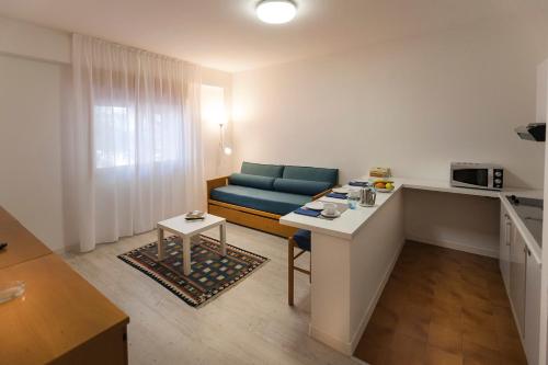Imagen de la habitación del Hotel Roma Aparthotel. Foto 7