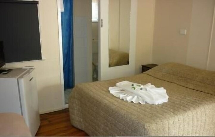 Imagen de la habitación del Hotel Roma Aussie Tourist Park. Foto 19