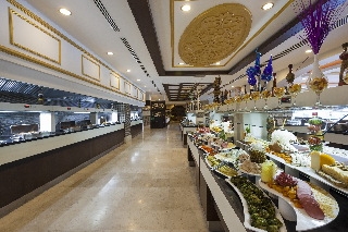 Imagen del bar/restaurante del Hotel Roma Beach Resort and Spa. Foto 9