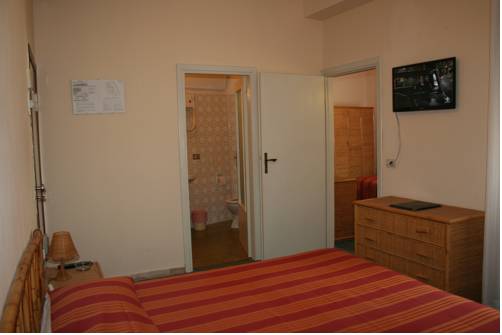 Imagen de la habitación del Hotel Roma, Castiglione della Pescaia. Foto 2