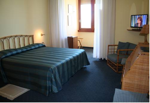 Imagen de la habitación del Hotel Roma, Castiglione della Pescaia. Foto 3