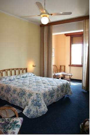 Imagen de la habitación del Hotel Roma, Castiglione della Pescaia. Foto 4
