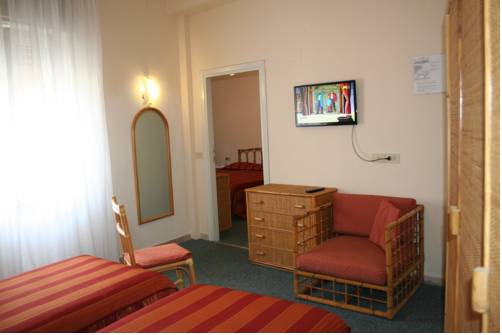 Imagen de la habitación del Hotel Roma, Castiglione della Pescaia. Foto 5