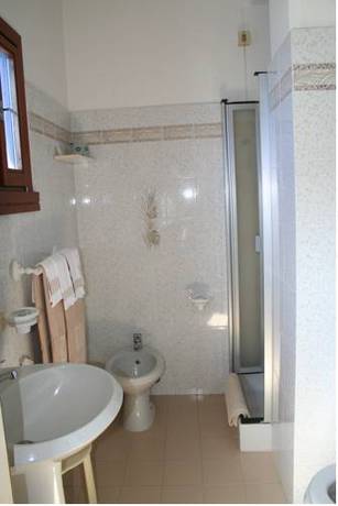 Imagen de la habitación del Hotel Roma, Castiglione della Pescaia. Foto 6