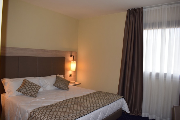 Imagen de la habitación del Hotel Roma Domus. Foto 7