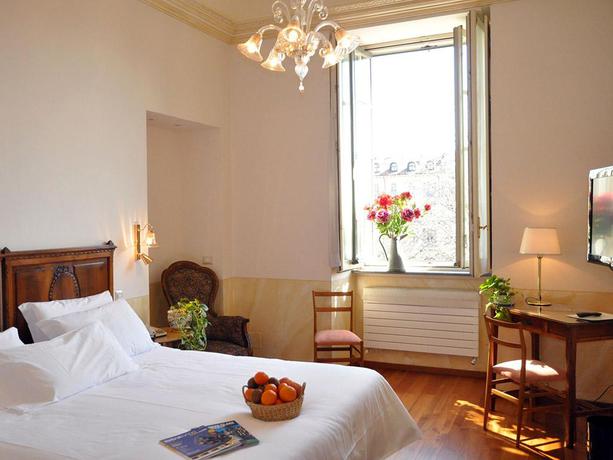 Imagen de la habitación del Hotel Roma E Rocca Cavour. Foto 4