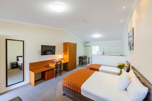Imagen de la habitación del Hotel Roma Explorers Inn. Foto 9