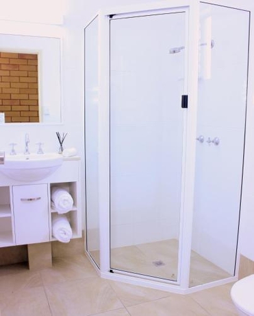 Imagen de la habitación del Hotel Roma Mid Town Motor Inn. Foto 7