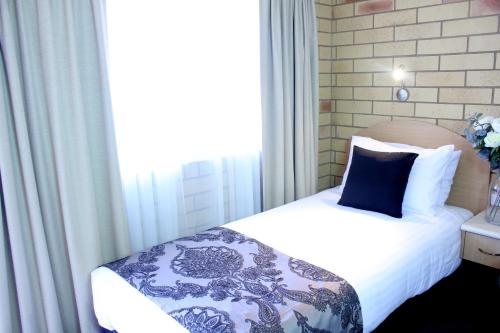 Imagen general del Hotel Roma Mid Town Motor Inn. Foto 1