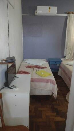 Imagen de la habitación del Hotel Roma, Porto Alegre. Foto 18