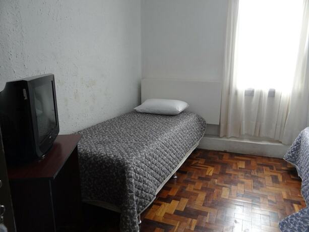Imagen de la habitación del Hotel Roma, Porto Alegre. Foto 26