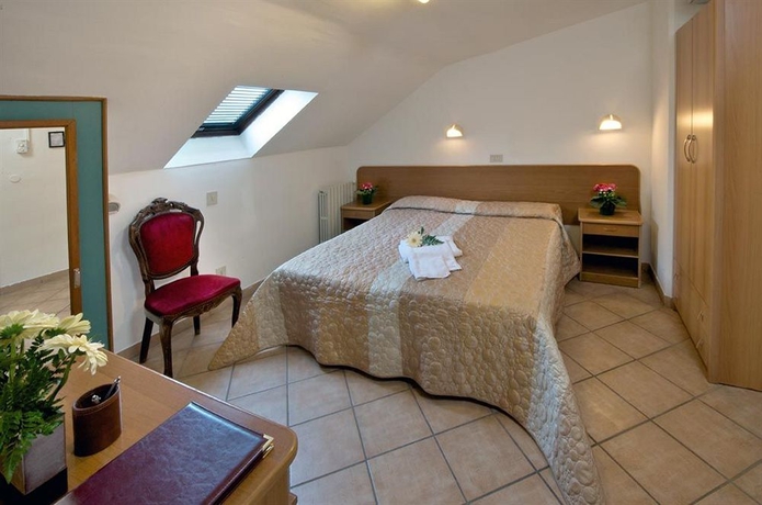 Imagen de la habitación del Hotel Roma, Ravenna. Foto 5