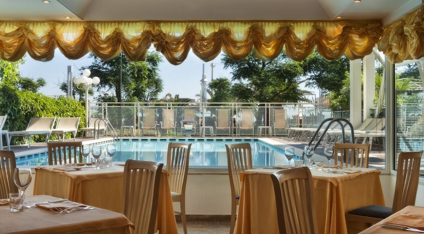 Imagen del bar/restaurante del Hotel Roma, Riccione. Foto 2