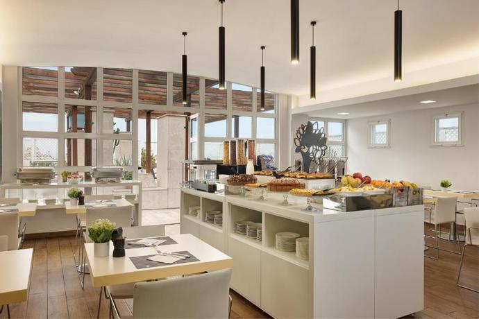 Imagen del bar/restaurante del Hotel Roma Tor Vergata. Foto 4