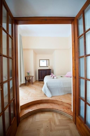 Imagen de la habitación del Hotel Roman Apartments. Foto 4