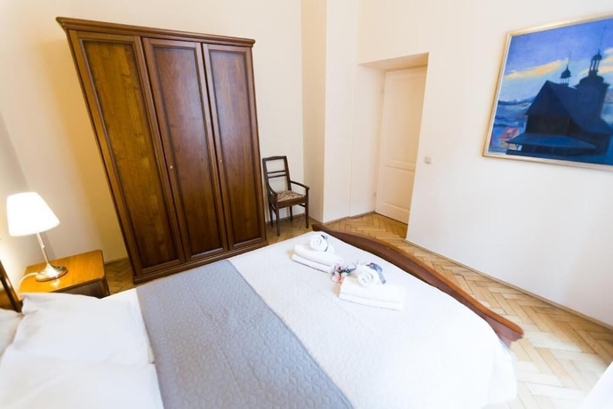 Imagen de la habitación del Hotel Roman Apartments. Foto 9