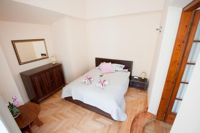 Imagen de la habitación del Hotel Roman Apartments. Foto 14