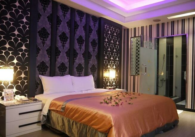 Imagen de la habitación del Hotel Roman Vacation Motel. Foto 13