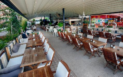 Imagen del bar/restaurante del Hotel Romance Beach. Foto 21