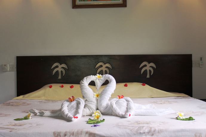 Imagen de la habitación del Hotel Romance Bungalows. Foto 4