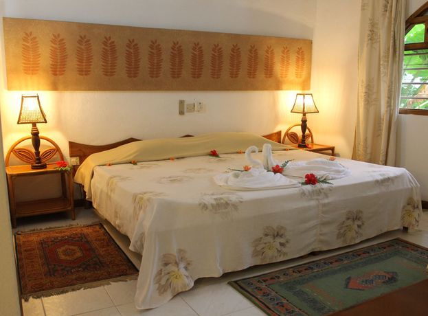 Imagen de la habitación del Hotel Romance Bungalows. Foto 7