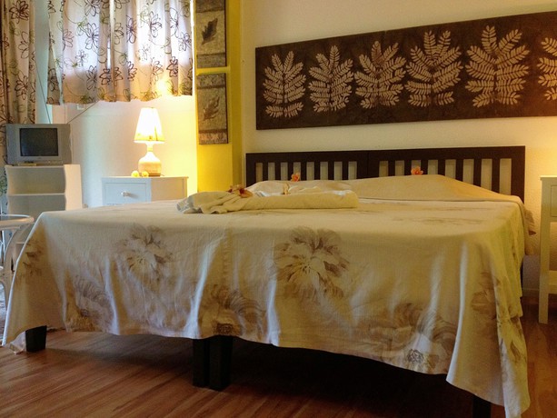 Imagen de la habitación del Hotel Romance Bungalows. Foto 9
