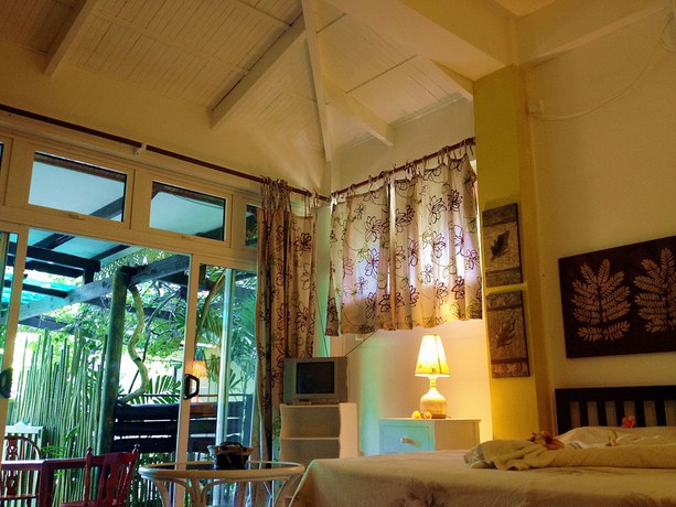 Imagen de la habitación del Hotel Romance Bungalows. Foto 15