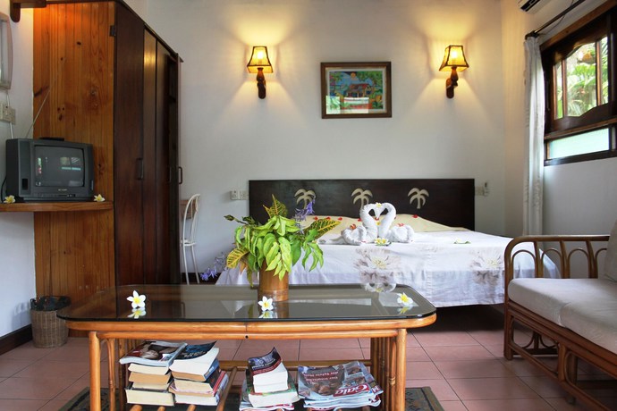 Imagen de la habitación del Hotel Romance Bungalows. Foto 16
