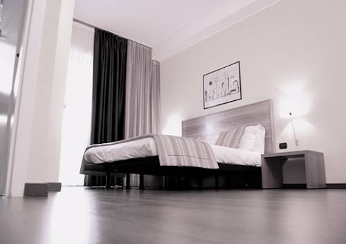 Imagen de la habitación del Hotel Romanisio. Foto 4