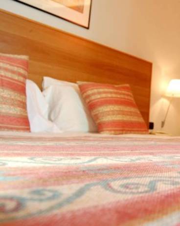 Imagen de la habitación del Hotel Romanisio. Foto 8